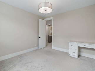 Discover this charming room, perfect for a home office or a cozy bedroom.