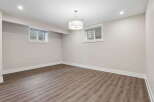 Discover this spacious and bright unfinished basement, perfect for customization.