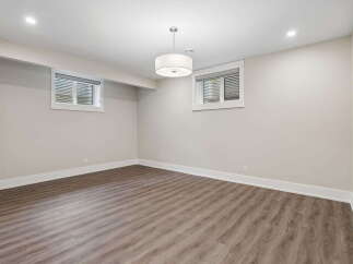 Discover this spacious and bright unfinished basement, perfect for customization.