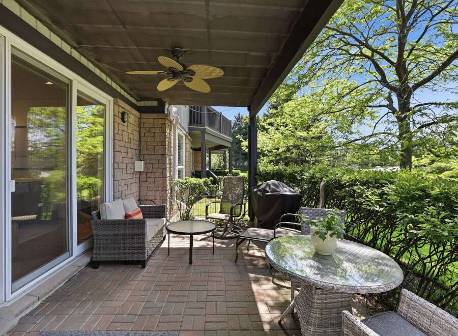 Enjoy outdoor living on this spacious patio, perfect for entertaining or relaxing.