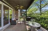 Enjoy outdoor living on this spacious patio, perfect for entertaining or relaxing.