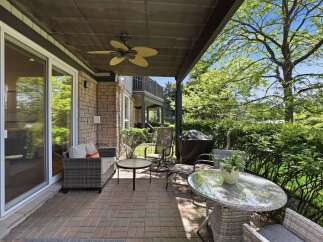 Enjoy outdoor living on this spacious patio, perfect for entertaining or relaxing.