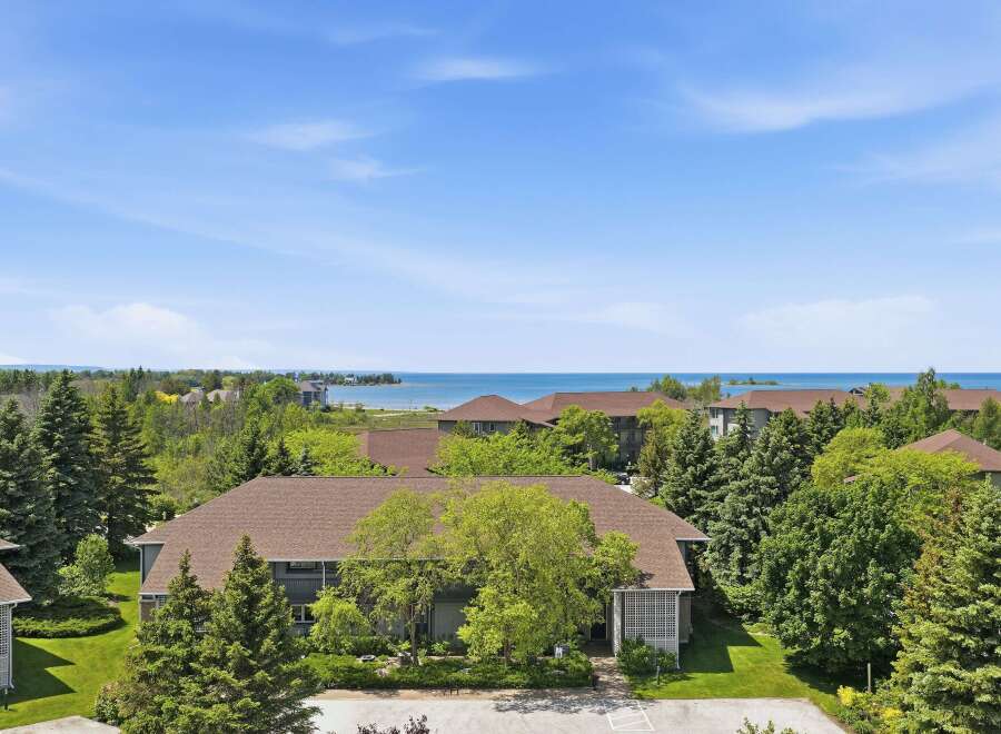 Experience serene living with this stunning property offering breathtaking views of the water.
