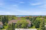 Experience serene living with this stunning property offering breathtaking views of the water.