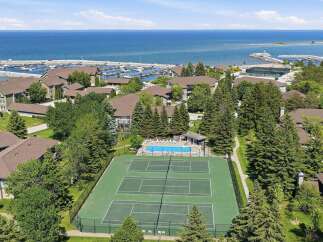 Experience resort-style living with this stunning aerial view showcasing a vibrant community.