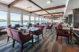 Experience elegant dining with breathtaking lake views in this stunning restaurant.