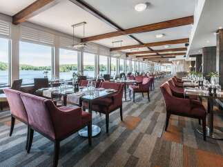 Experience elegant dining with breathtaking lake views in this stunning restaurant.