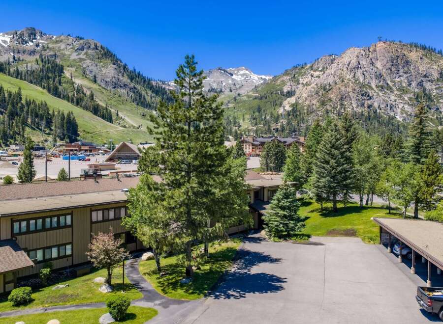 Nestled against a stunning mountain backdrop, this property offers a serene retreat with convenient access to outdoor adventures.