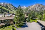 Nestled against a stunning mountain backdrop, this property offers a serene retreat with convenient access to outdoor adventures.