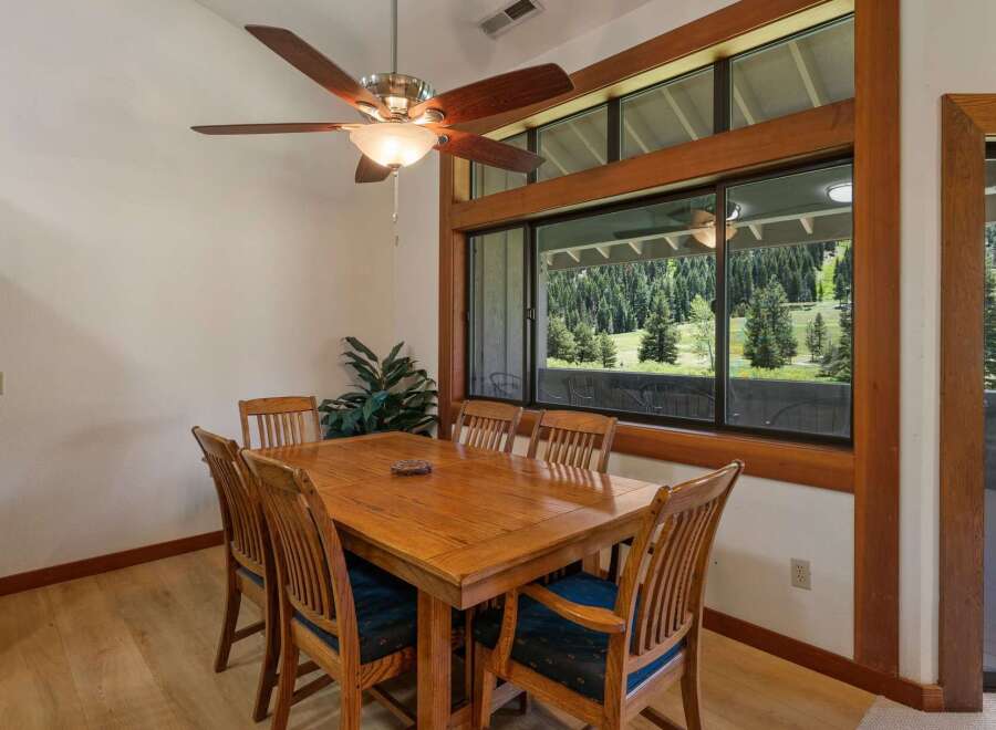 Enjoy breathtaking mountain views from this charming dining area, perfect for intimate meals or lively gatherings.