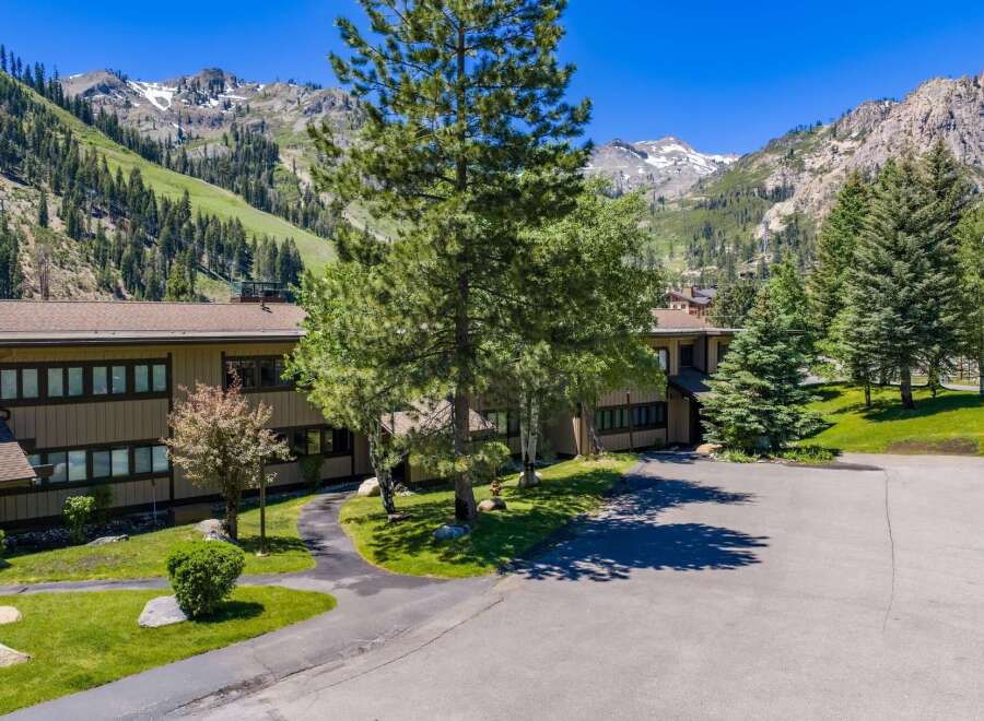 Experience mountain living in this stunning property, nestled against a backdrop of majestic, snow-capped peaks and lush green slopes.