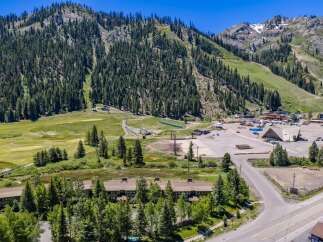 Discover this stunning mountain property offering a unique blend of recreational activities and comfortable living.
