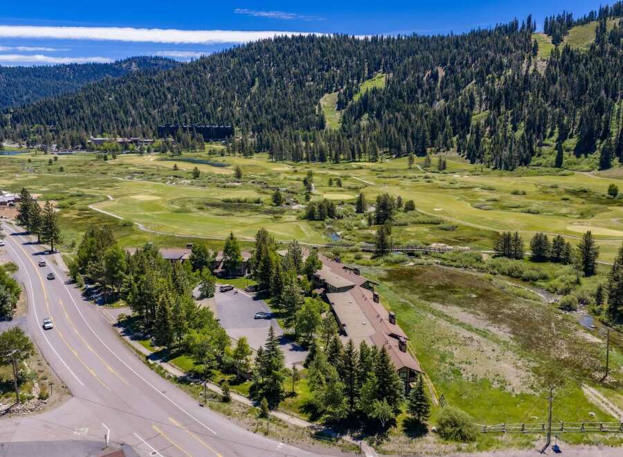 Nestled amidst a picturesque golf course and surrounded by lush pine forests, this property offers a serene mountain retreat.