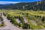 Nestled amidst a picturesque golf course and surrounded by lush pine forests, this property offers a serene mountain retreat.