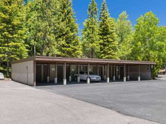 Discover convenient covered parking with this carport, offering protection for your vehicle from the elements.