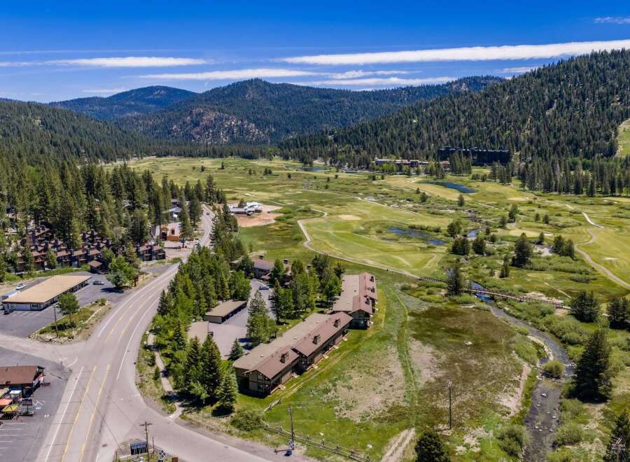 Discover this stunning property nestled amidst a picturesque mountain landscape, offering a unique blend of natural beauty and recreational opportunities.