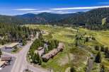 Discover this stunning property nestled amidst a picturesque mountain landscape, offering a unique blend of natural beauty and recreational opportunities.