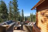 Experience breathtaking lake and mountain views from this stunning deck, perfect for entertaining or relaxing.
