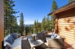 Experience breathtaking lake and mountain views from this stunning deck, perfect for entertaining or relaxing.