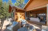Experience seamless indoor-outdoor living with this stunning property, featuring a spacious deck perfect for entertaining and relaxing amidst a beautiful natural setting.