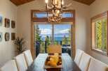 Experience breathtaking lake and mountain views from this stunning dining room, perfect for entertaining.