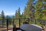 Enjoy breathtaking lake views from this stunning property, nestled amidst a serene pine forest.