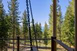 Experience breathtaking lake views from this stunning property, nestled amidst a serene pine forest.