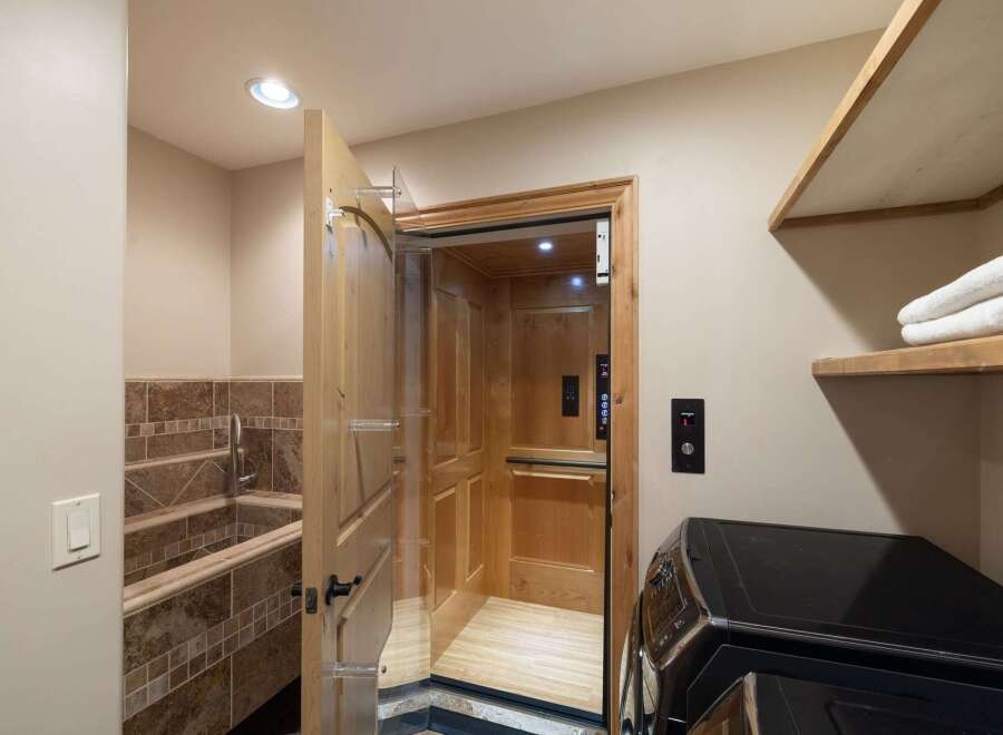 Experience ultimate convenience with this home's private elevator, perfect for multi-level living.