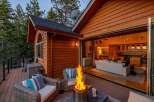 Experience seamless indoor-outdoor living with this stunning property, featuring a spacious deck with a cozy fire pit perfect for evening relaxation.