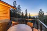 Enjoy breathtaking sunset views over the lake from this stunning deck, perfect for outdoor entertaining.