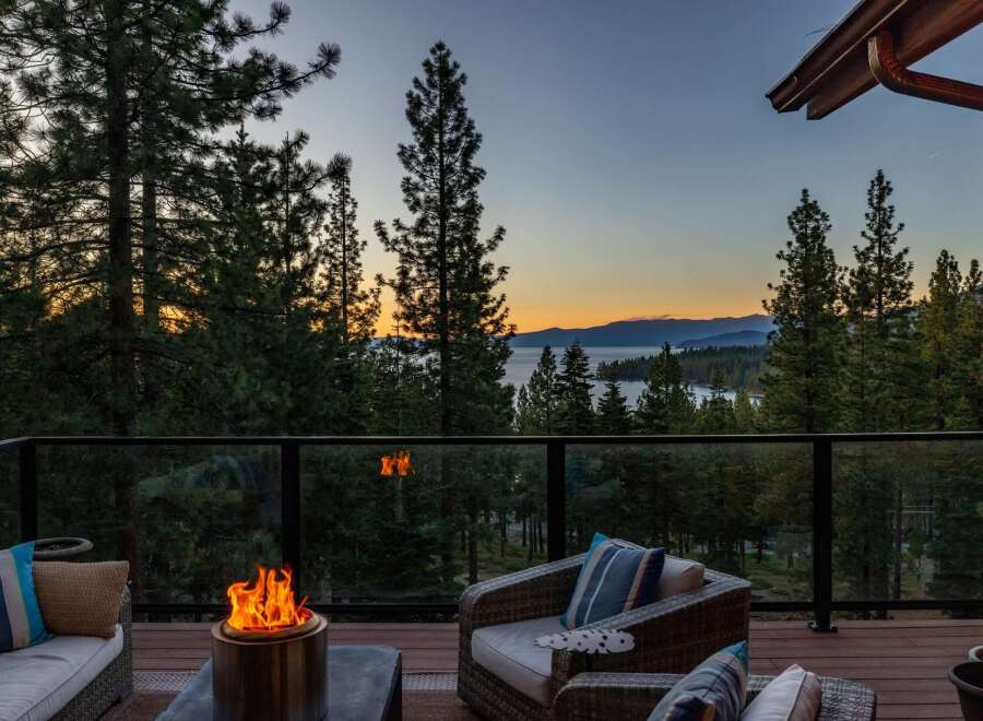 Enjoy breathtaking sunset views over the lake from this stunning mountain retreat.
