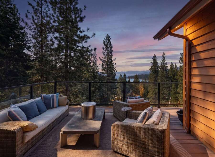 Experience breathtaking sunset views from this stunning mountain retreat's expansive deck.