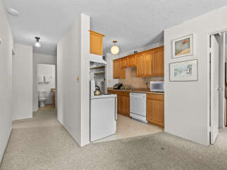 Discover this charming kitchen featuring ample oak cabinetry and a convenient dishwasher.