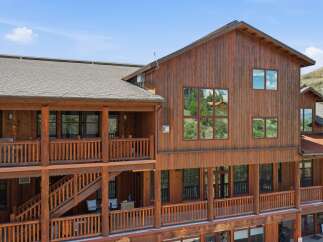 Experience rustic charm and stunning mountain views from this magnificent log-style lodge.