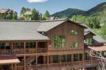 Experience rustic charm and mountain living in this stunning wooden lodge-style home.