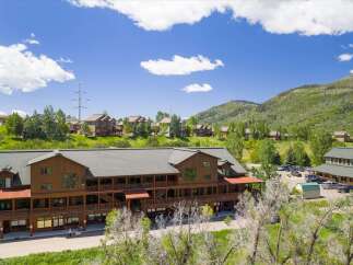 Discover this stunning multi-unit property nestled amidst picturesque mountain scenery.