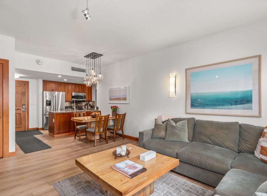 Experience modern living in this beautifully appointed condo, featuring an open-concept living and dining area perfect for entertaining.