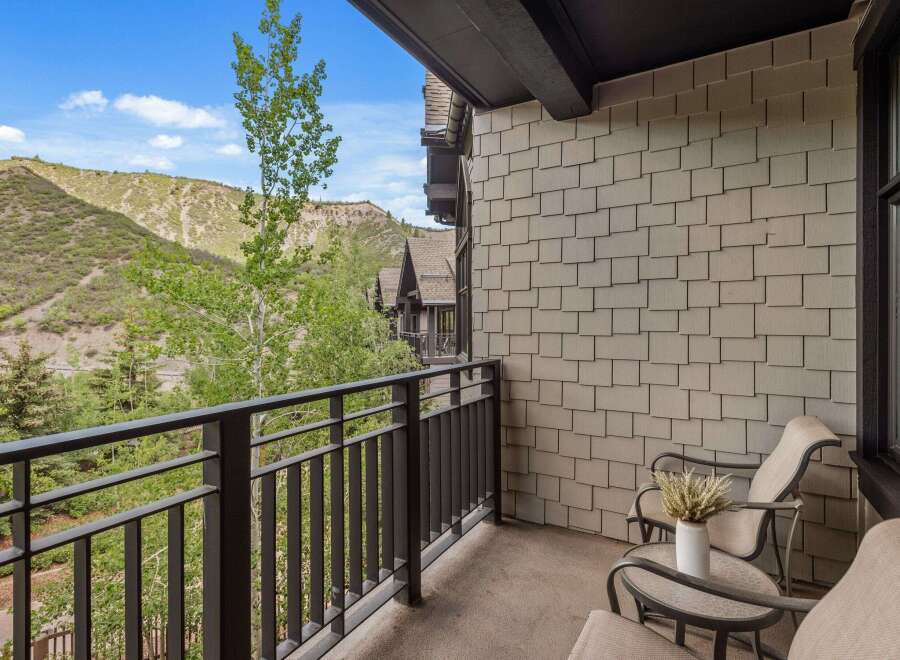 Enjoy breathtaking mountain views from this charming balcony, perfect for morning coffee or evening relaxation.