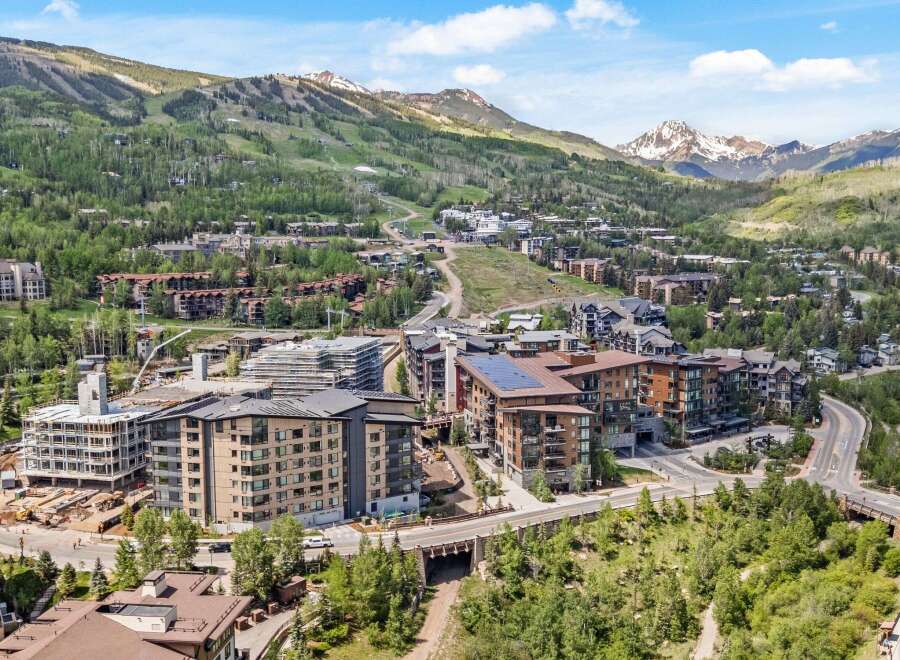 Discover modern mountain living in this vibrant community, featuring contemporary architecture and stunning natural surroundings.