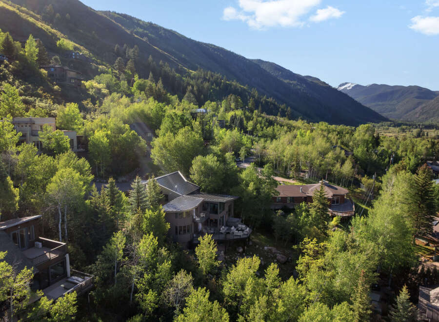 Nestled amidst lush greenery and rolling hills, this stunning mountain property offers a serene escape with breathtaking views.