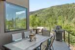 Enjoy breathtaking mountain views from this stunning deck, perfect for outdoor dining and entertaining.