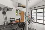 Transform your garage into a personal fitness sanctuary with this well-equipped home gym.
