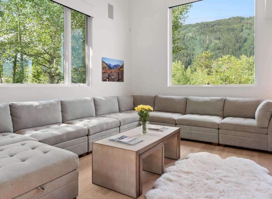 Experience modern living with this spacious sectional sofa, perfect for gathering with loved ones.