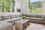 Experience modern living with this spacious sectional sofa, perfect for gathering with loved ones.
