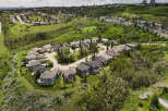 Discover this stunning suburban neighborhood nestled amidst rolling green hills and lush trees.