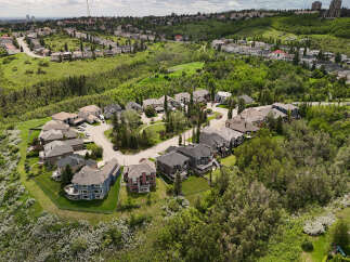 Discover this stunning suburban neighborhood nestled amidst rolling green hills and lush trees.