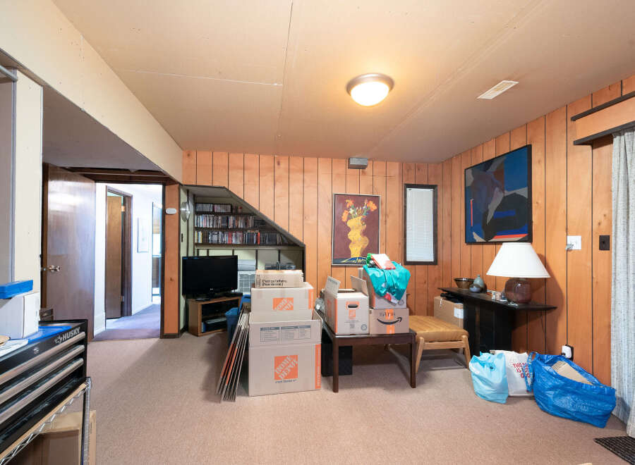 Discover potential in this versatile basement space, perfect for a home office, gym, or extra living area.