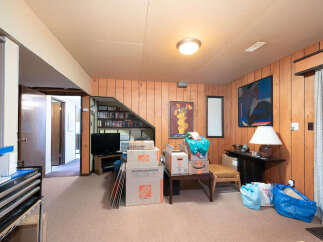 Discover potential in this versatile basement space, perfect for a home office, gym, or extra living area.