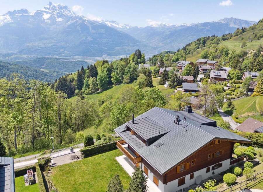 Experience breathtaking mountain views from this stunning chalet nestled in a serene alpine village.