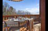 Enjoy a delightful breakfast on this balcony with breathtaking mountain views.